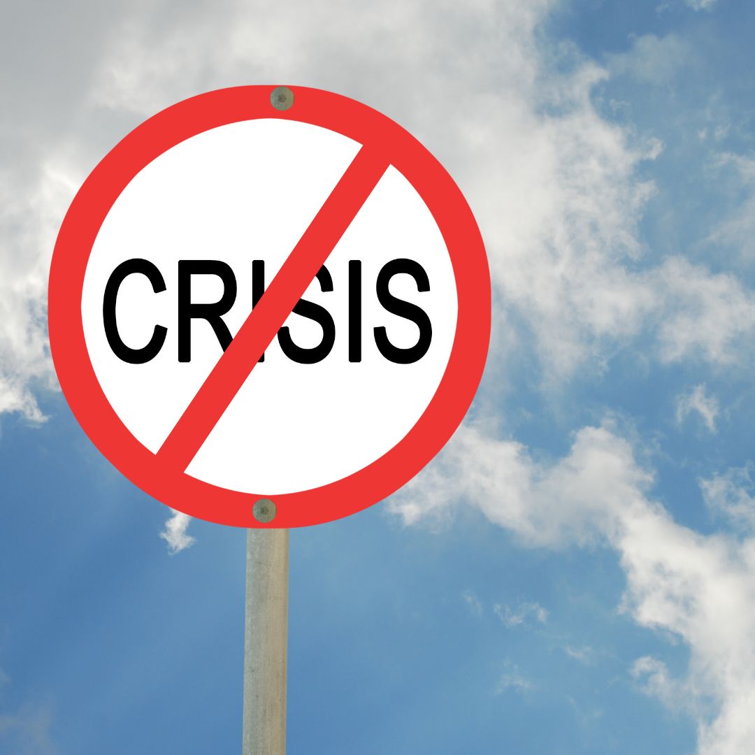 Crisis sign with a red line through it